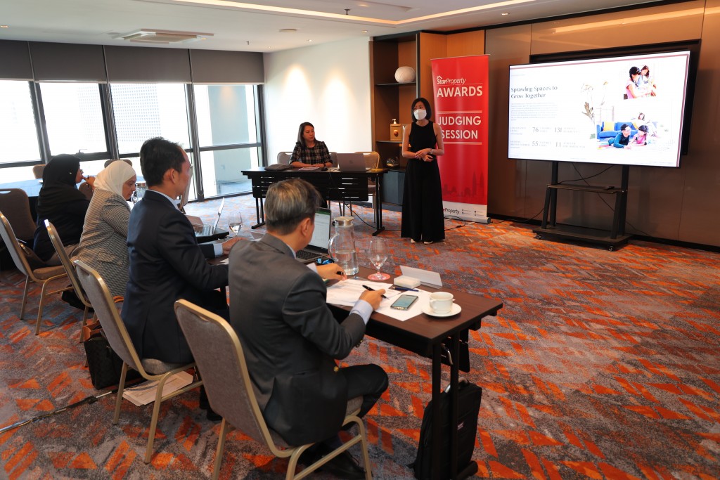 One of the presenters going through the slides as she explained the aspects of the property to a panel of judges during the StarProperty Awards 2023 judging session.