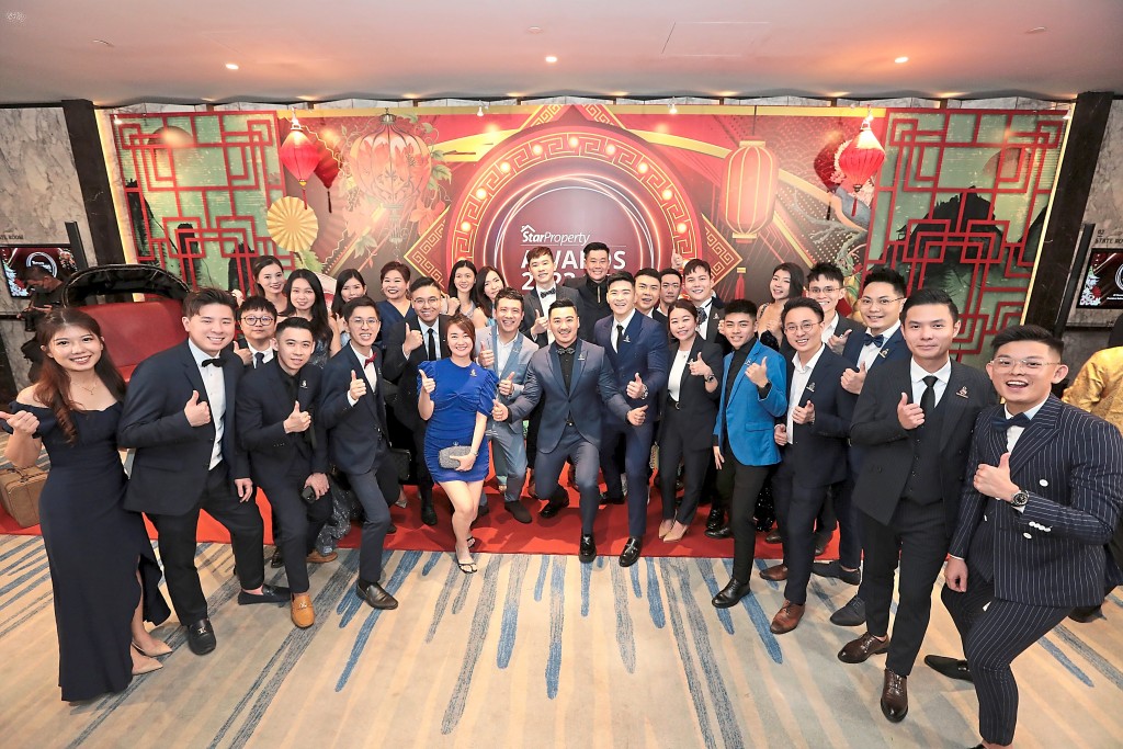 Nexsgen Realty comprises many happy colleagues, all ready to celebrate their achievements.