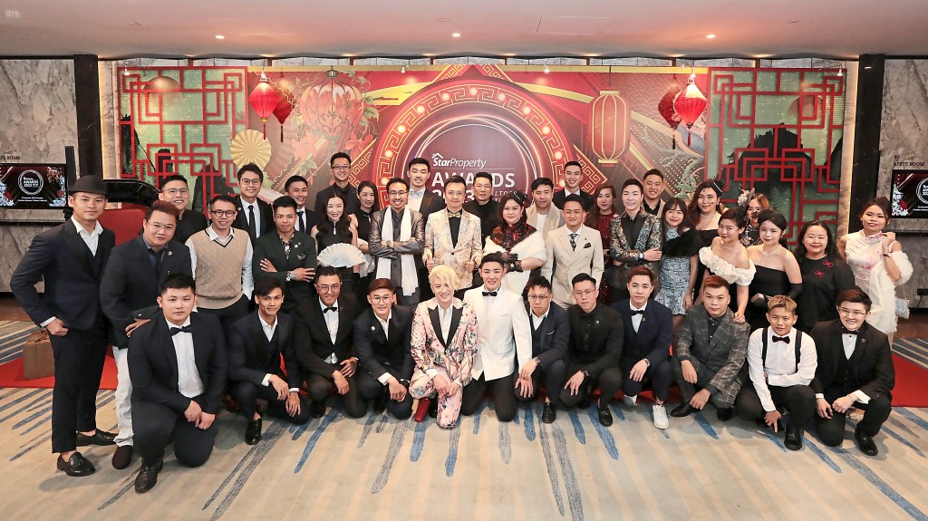 The Foreward Realty members are all dressed for the occasion.