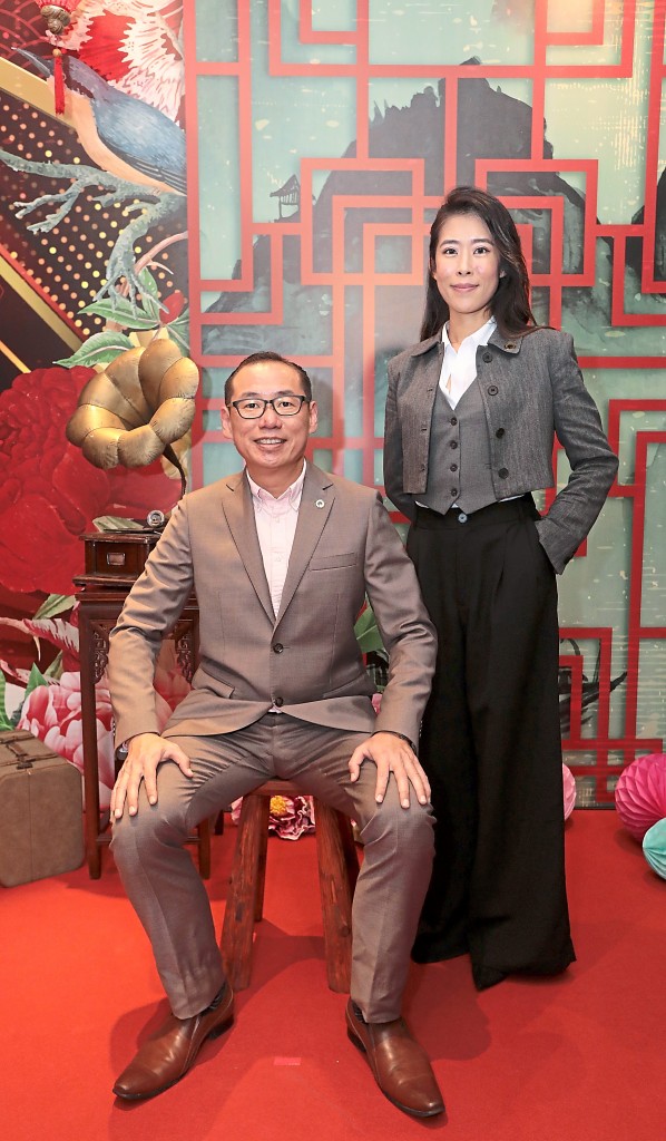 Ken Yap (left) and Jacelyn Tan from Quinco Realty takes a traditional style photo.