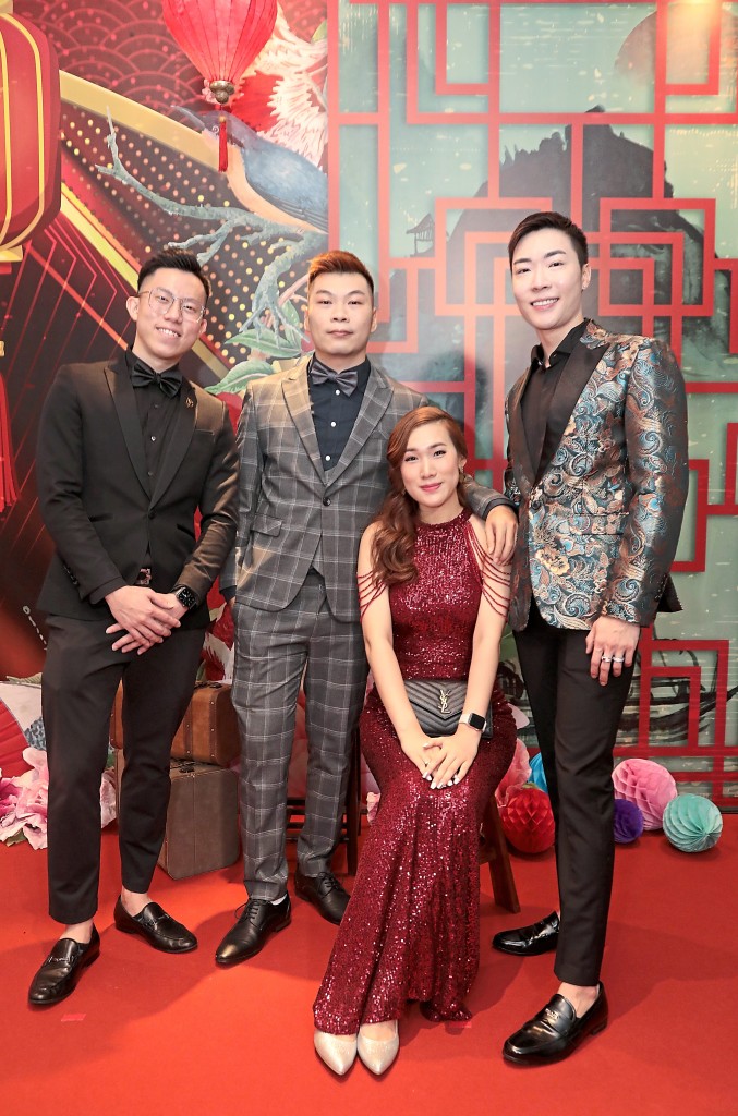 (From left) Charlie Chia, Larry Kum, Elaine Chong, Vincent Chan from Foreward Realty strike a pose for the photographer.