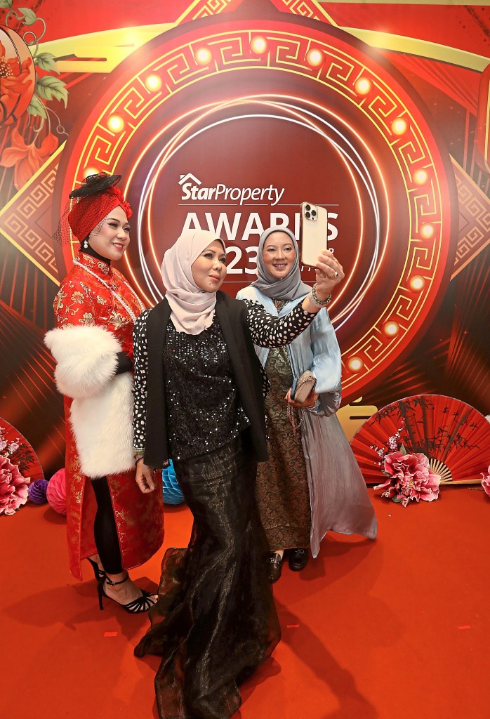 The IQI Realty strike a pose.