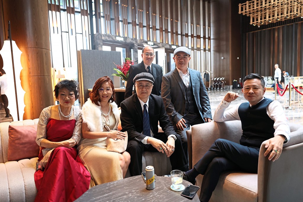 (From left): Melissa Kee, Carine Ng, Barry Ong, Chen Ching Huei, Sebastian Siew, Alex Lee from Tech Realtors Properties chill at the lobby prior to the event.