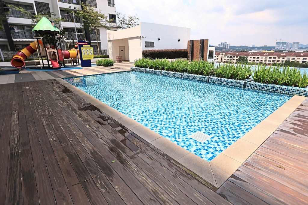 The children's playground and wading pool is next to the Olympic-length infinity pool.