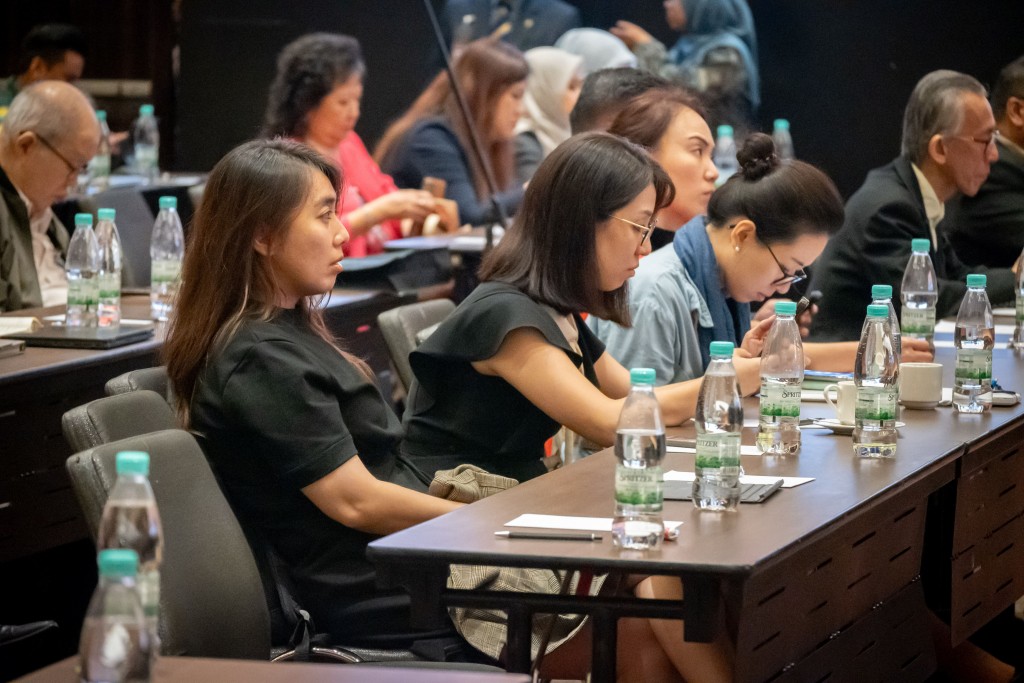 The participants listening to the presentation.