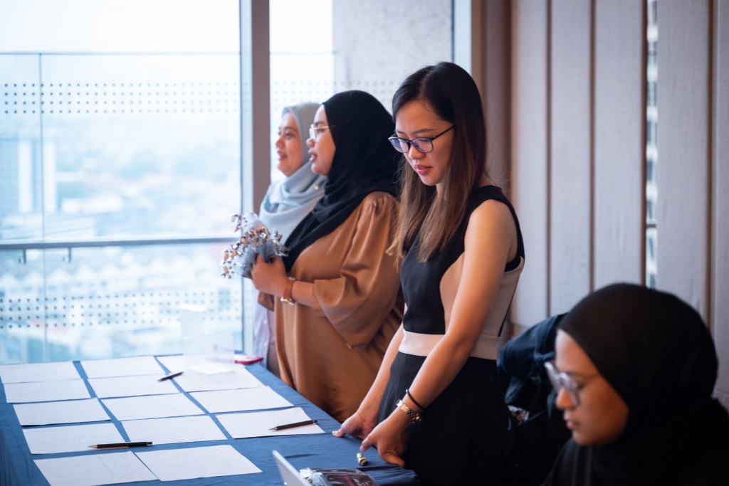 The RISM team stands ready to greet and register the participants.