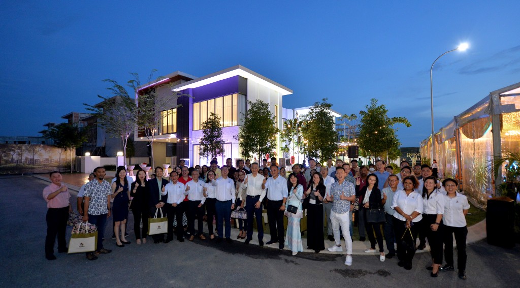 The Matrix Concepts team taking a group photo with quests and members of the media.