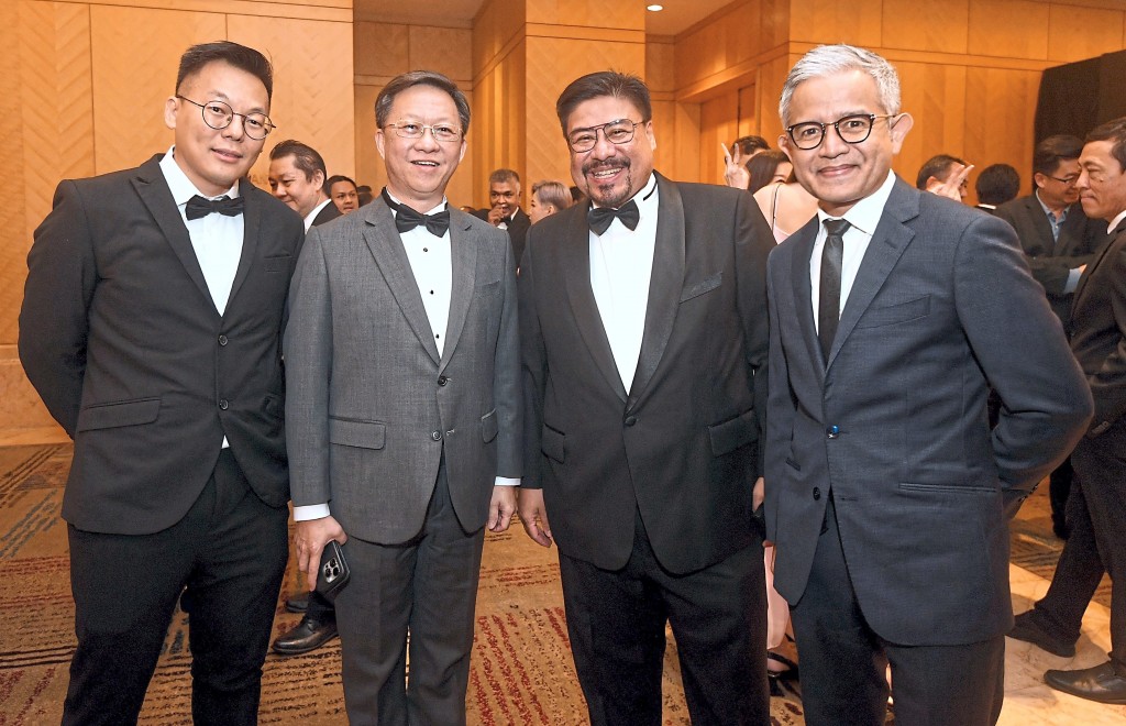 Taking a quick photo (from left) are SkyWorld Development Bhd finance head Low Weng Cheong, Star Media Group chief executive officer Chan Seng Fatt, UEM Sunrise chief financial officer Hafizuddin Sulaiman as well as product innovation and LAB head Asdinor Hakim Anuar Apandi.  —AZHAR MAHFOF/The Star
