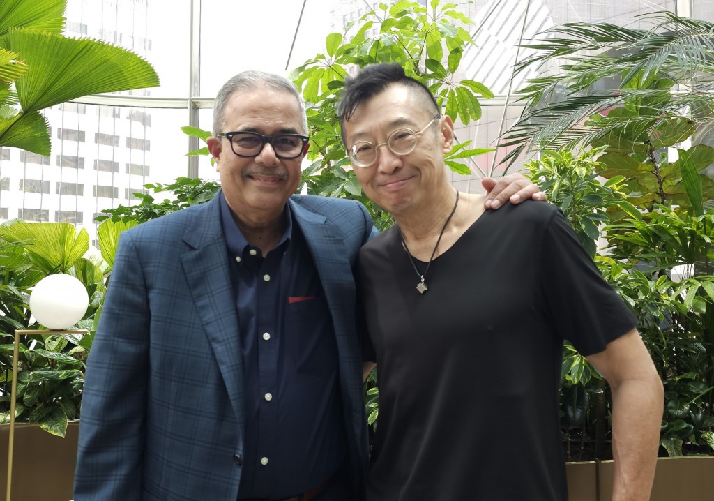The writer (left) met up with Yap in Singapore recently.
