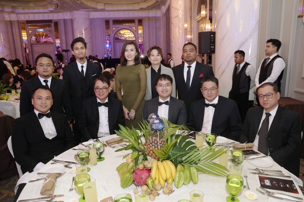 Team WM Senibong Sdn Bhd dressed up for the occasion.— ART CHEN/The Star