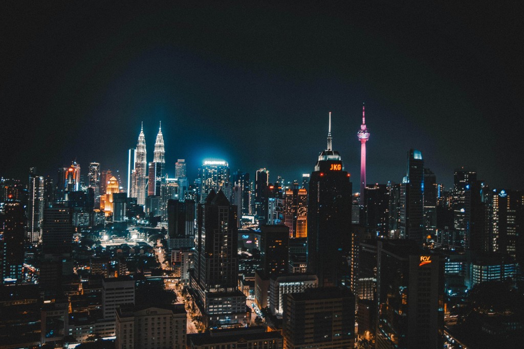 KLCC's night skyline is reflective of Batman's Gotham, full of its own secrets. - Photo by David Egon