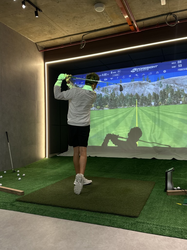A premium golf academy at The MET allows for after-work recreation.